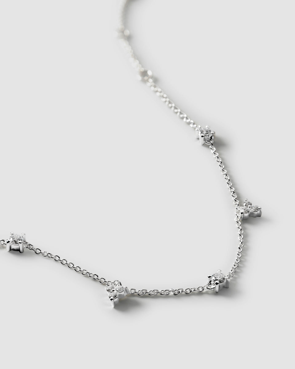 A close-up image of the Celestia Bracelet in silver, detailing its fine chain design adorned with sparkling cubic zirconia stones.