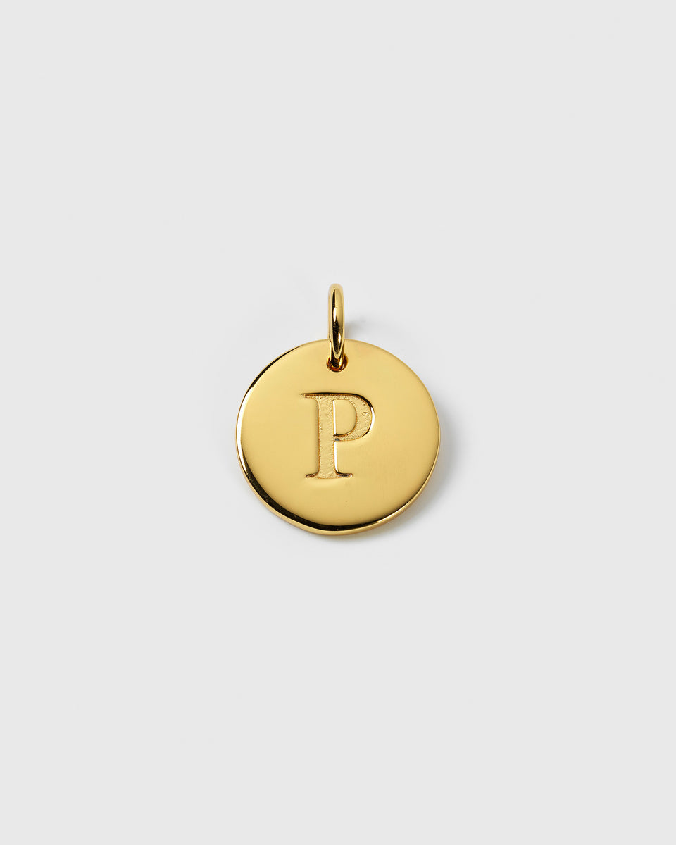 A product shot of the Beloved Big Letter Gold pendant, showing the round gold charm with the initial 'P' engraved in the center.