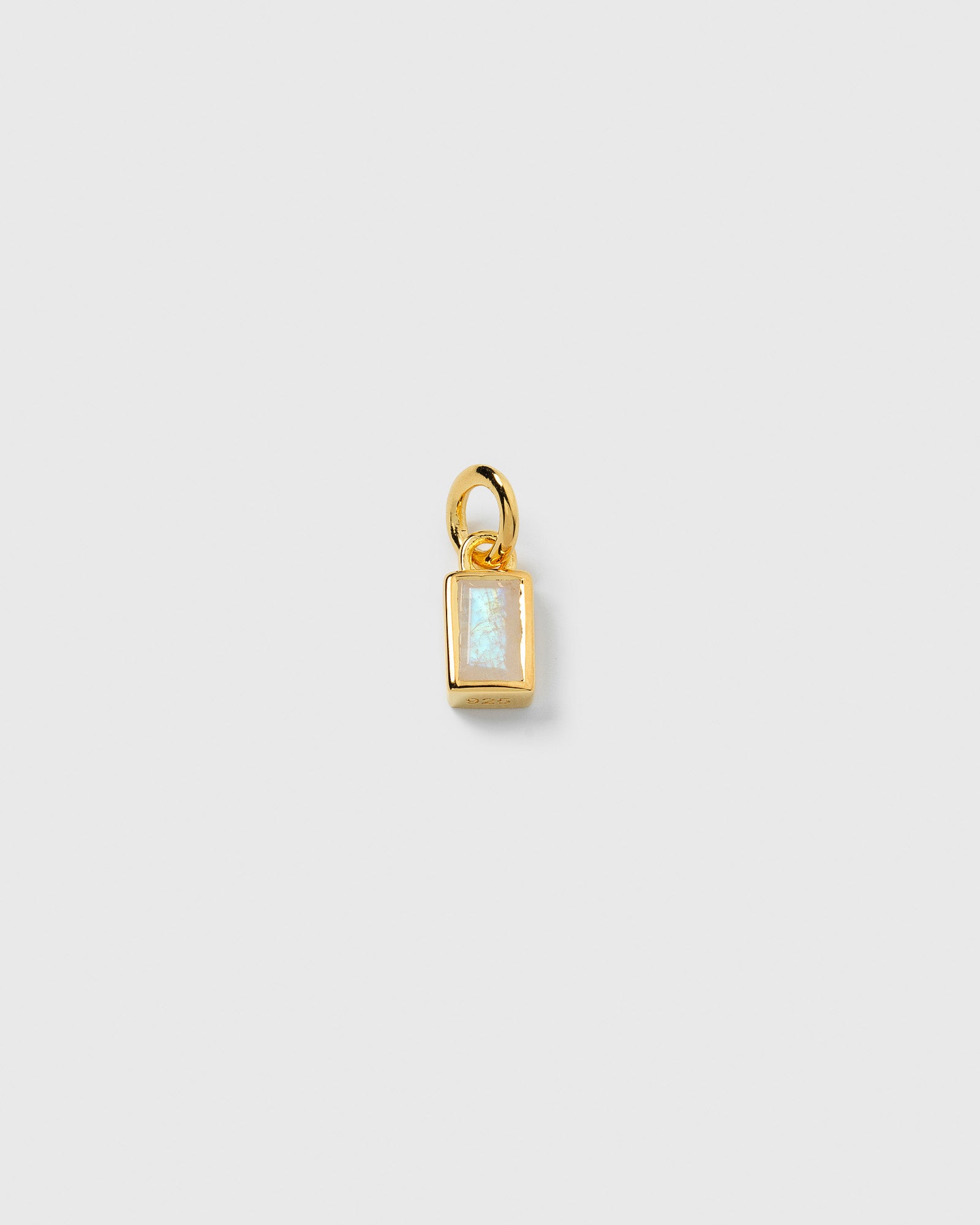 A product shot of the Beloved Squared Pendant in gold, featuring a rectangular moonstone set in a gold-plated frame.