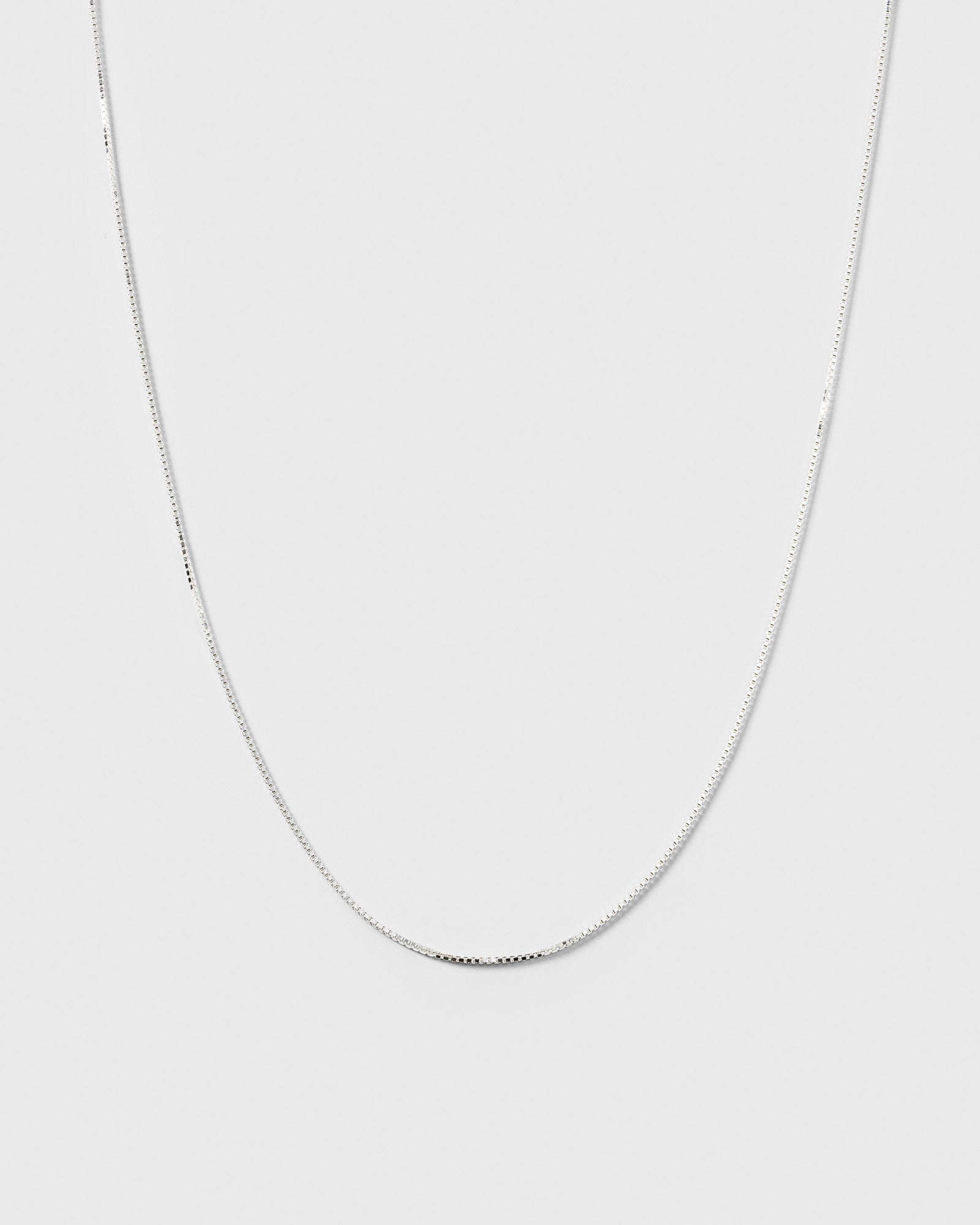 A product shot of the Beloved Medium Box Chain in silver, showing the delicate and timeless design of the necklace.