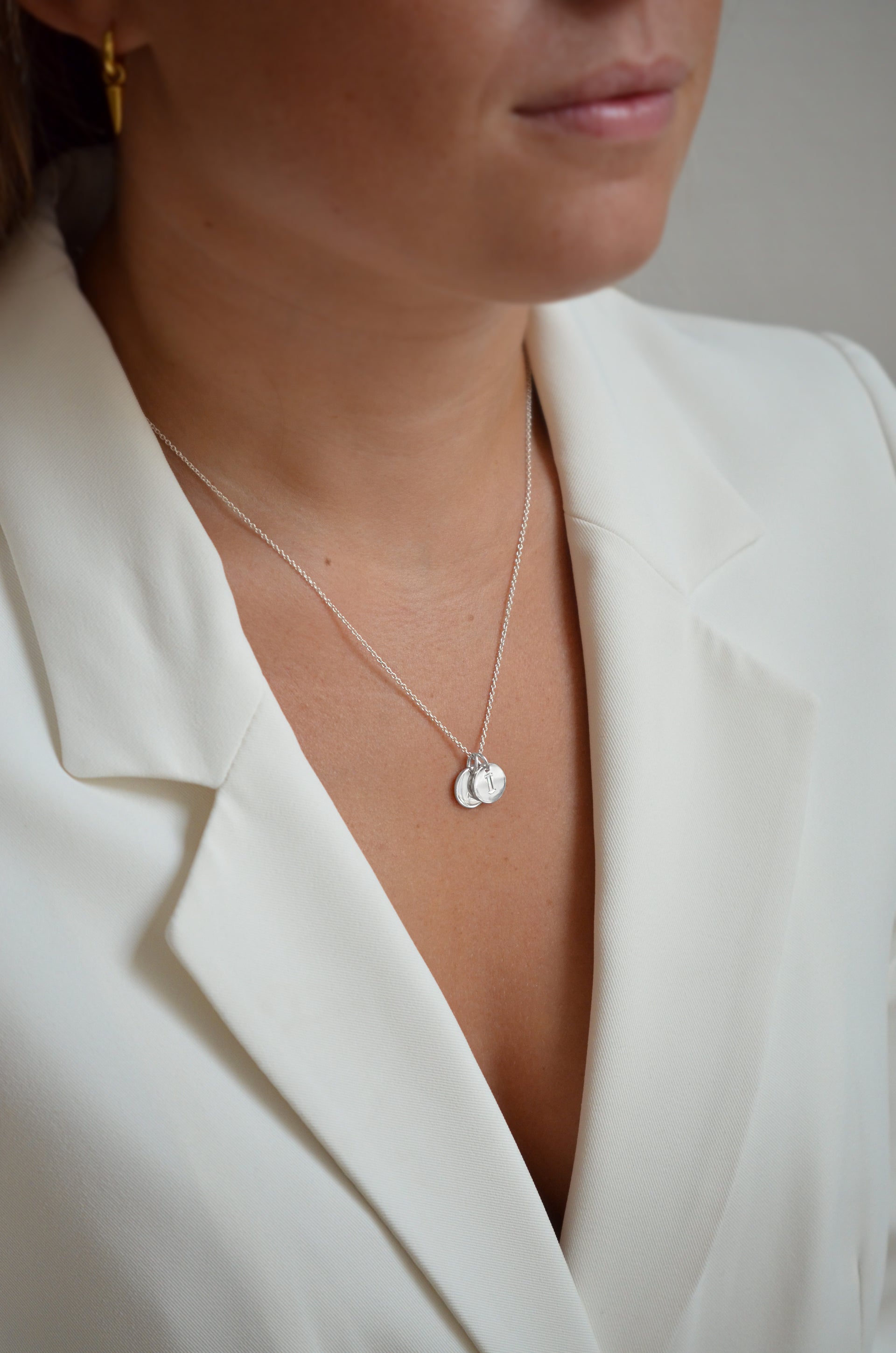 Silver chain with two mini letters 