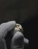 custom_The necklace is handmade using 100% recycled silver and a set crystal, designed with sustainability and craftsmanship in mind. In the video, you'll get a glimpse into the final step of the process — the precise placement of the crystal.