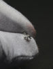 custom_The necklace is handmade using 100% recycled silver and a set crystal, designed with sustainability and craftsmanship in mind. The video shows the final step — the careful polishing that brings out the silver’s natural shine.